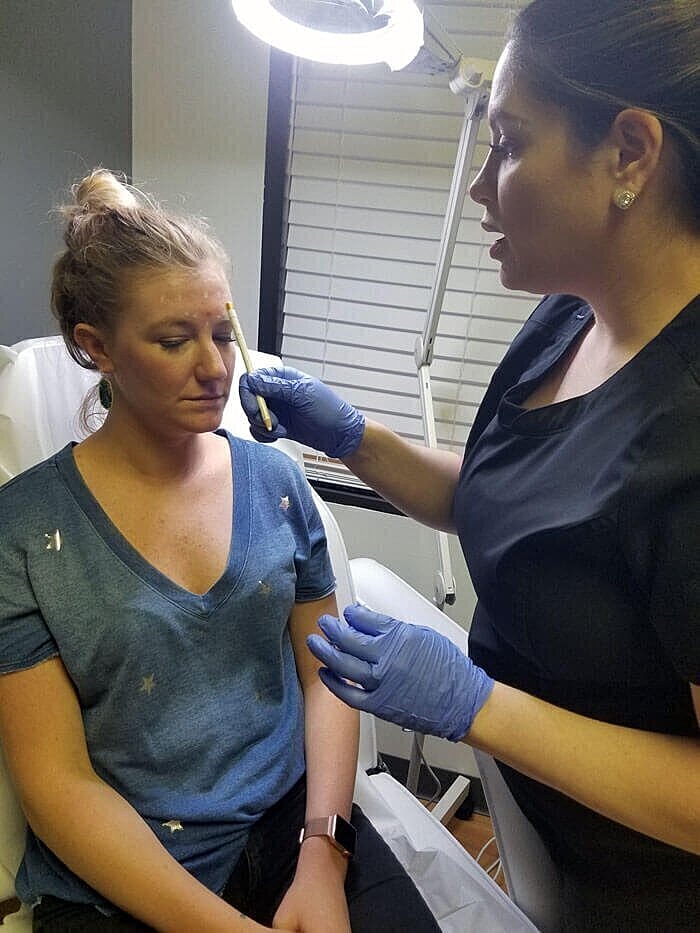 Beauty treatment session at a skincare clinic.