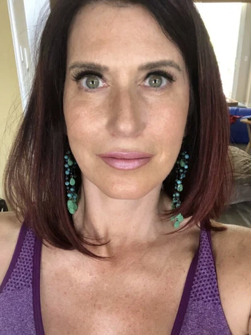 Portrait of a woman with stylish earrings.