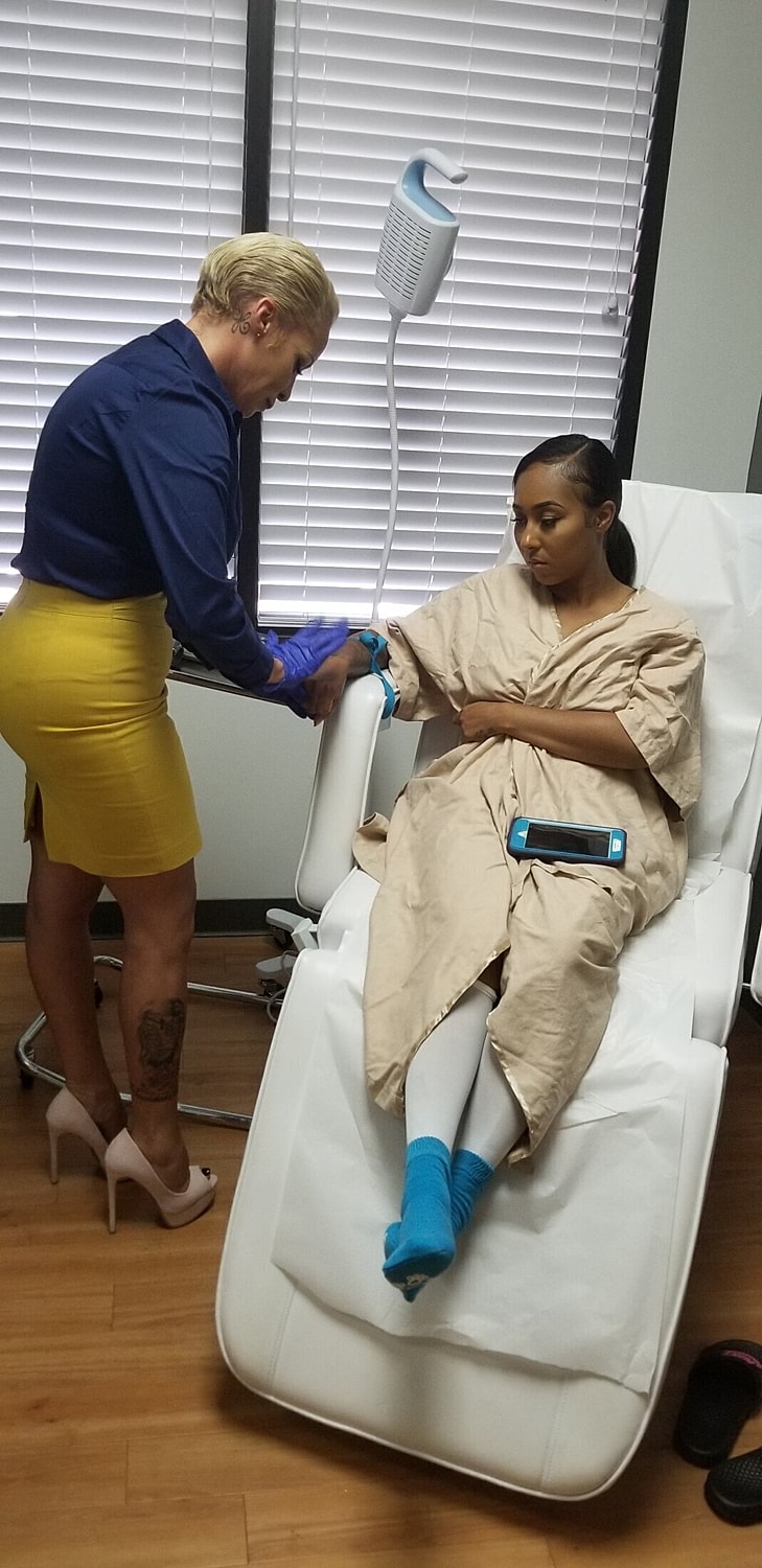 Patient receiving care in medical setting.