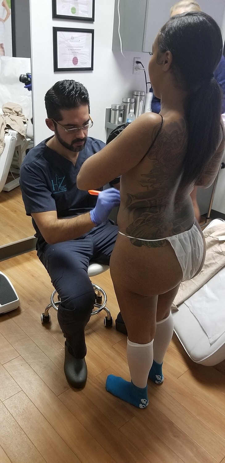 Patient receiving treatment in medical office.