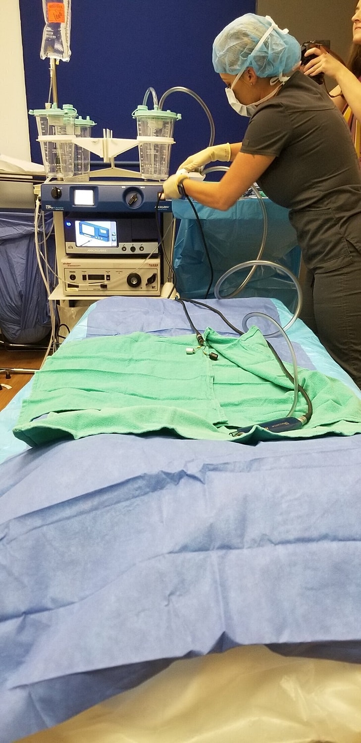 Medical professional preparing for a procedure.