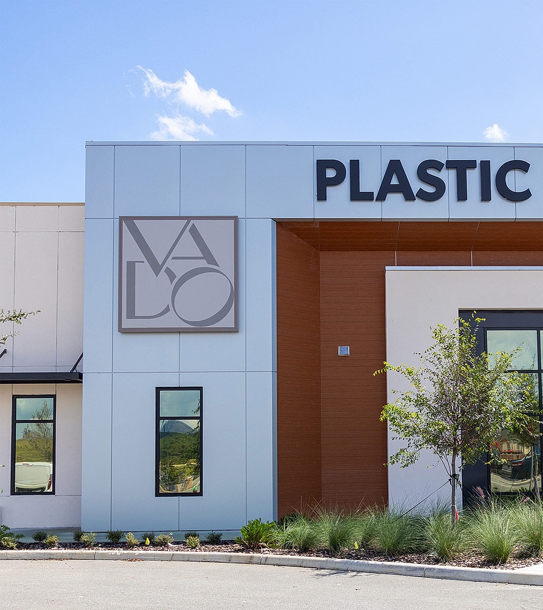 VADO Plastic Surgery building exterior with signage.